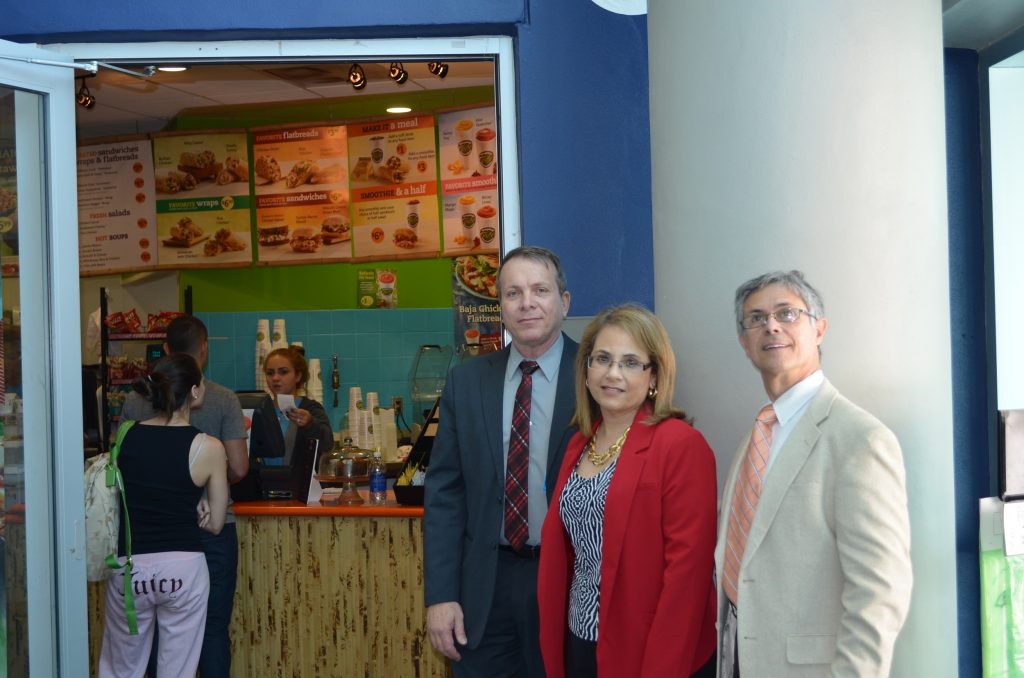 Florida National University Faculty members visit Daniel Diaz's Tropical Smoothies shop