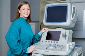 ultrasound technician student with equipment portrait at FNU 