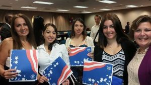 FNU students holding American flag posters