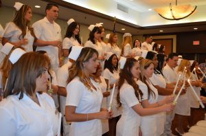 Florida National University Nursing Program Posing for award 