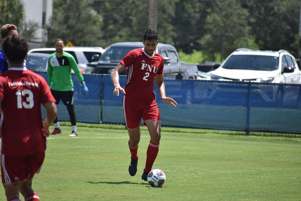 Adair Moreira FNU soccer player dribbling the ball on the field