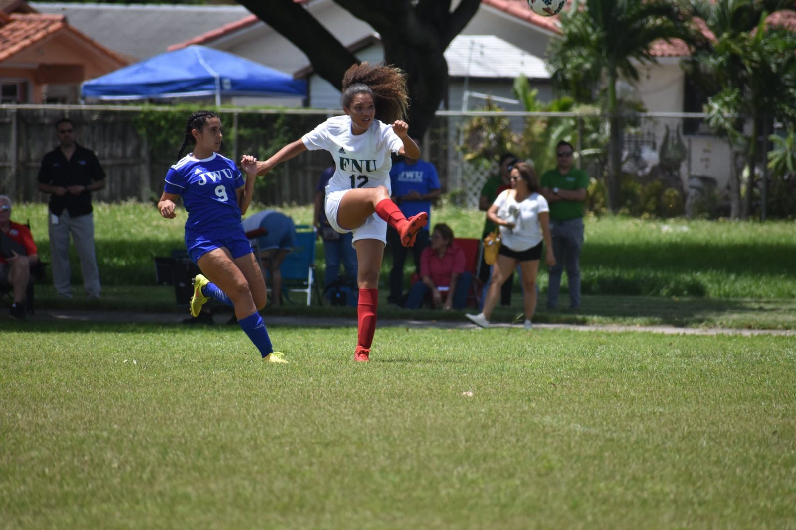 FNU player kicking the ball during the game