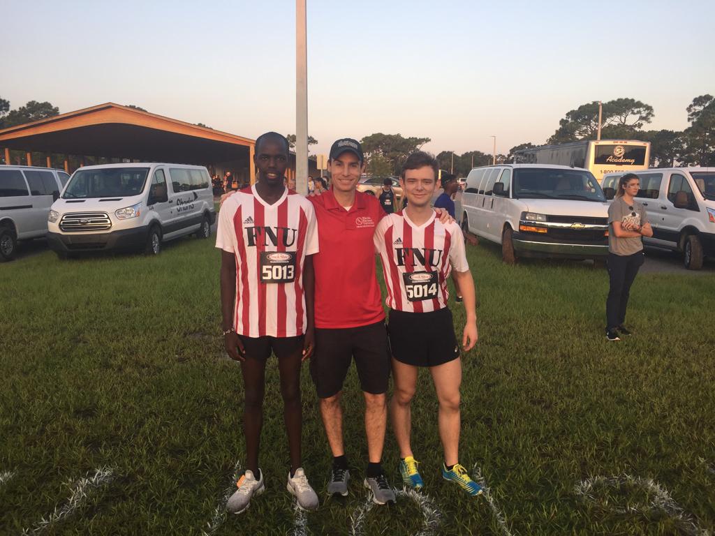FNU Cross Country runners with coach