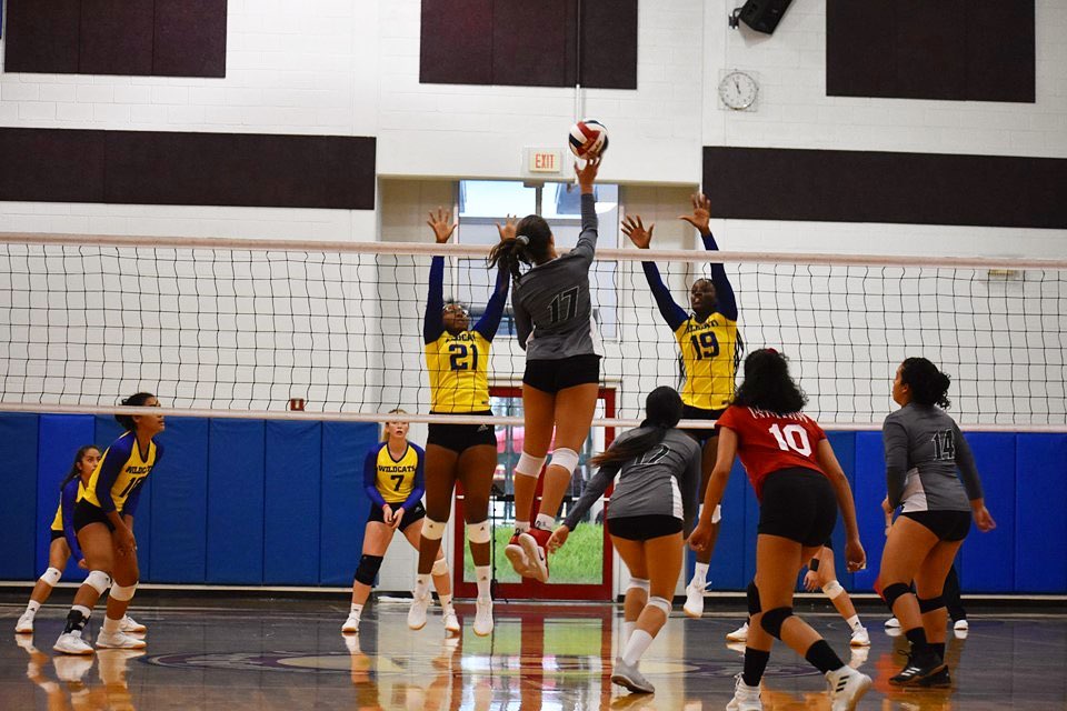 FNU volleyball player attacking in the game against Johnson and wales university 