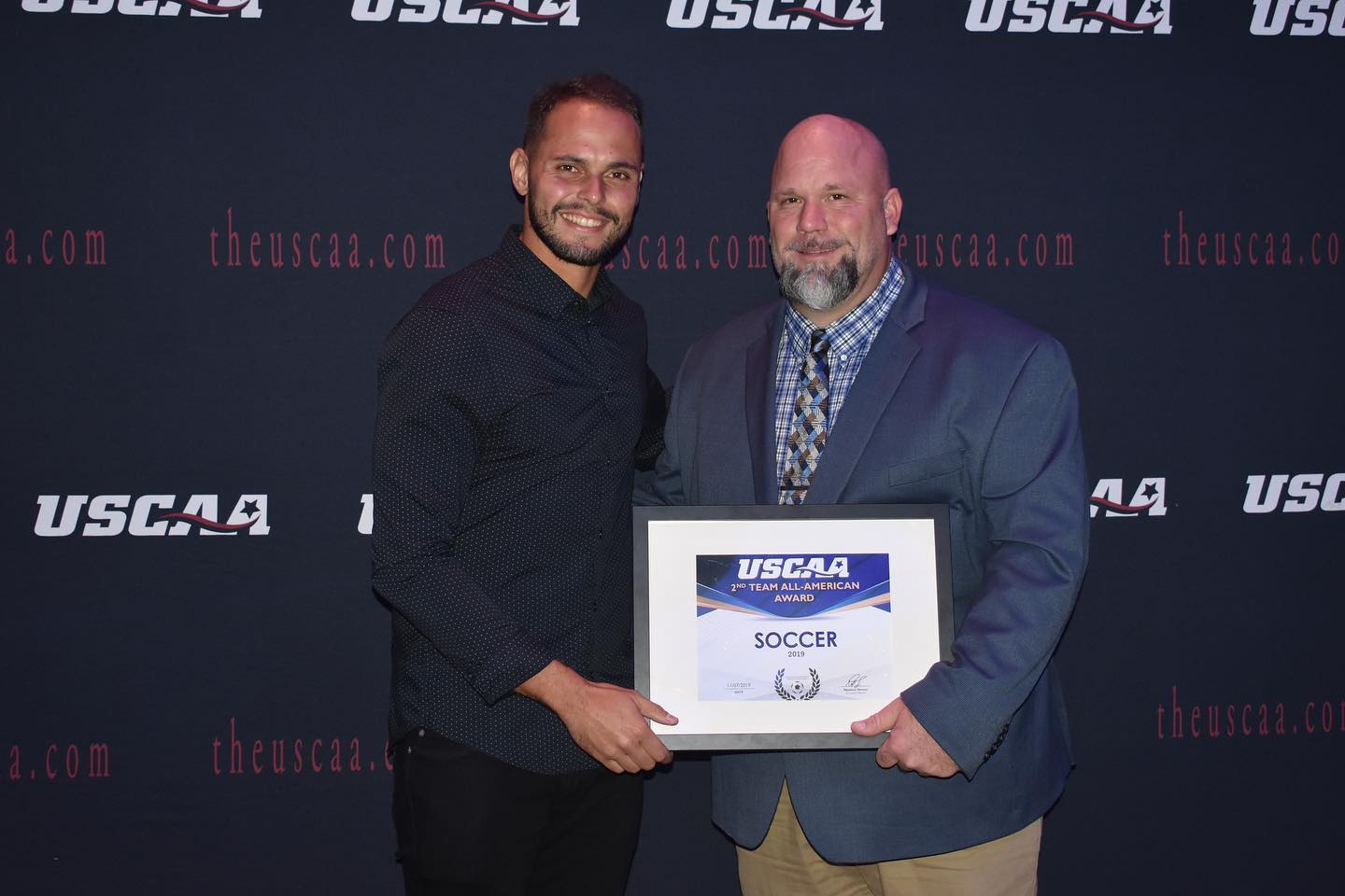 Men's Soccer player Rodrigo Festuccia receiving All-American second team Award