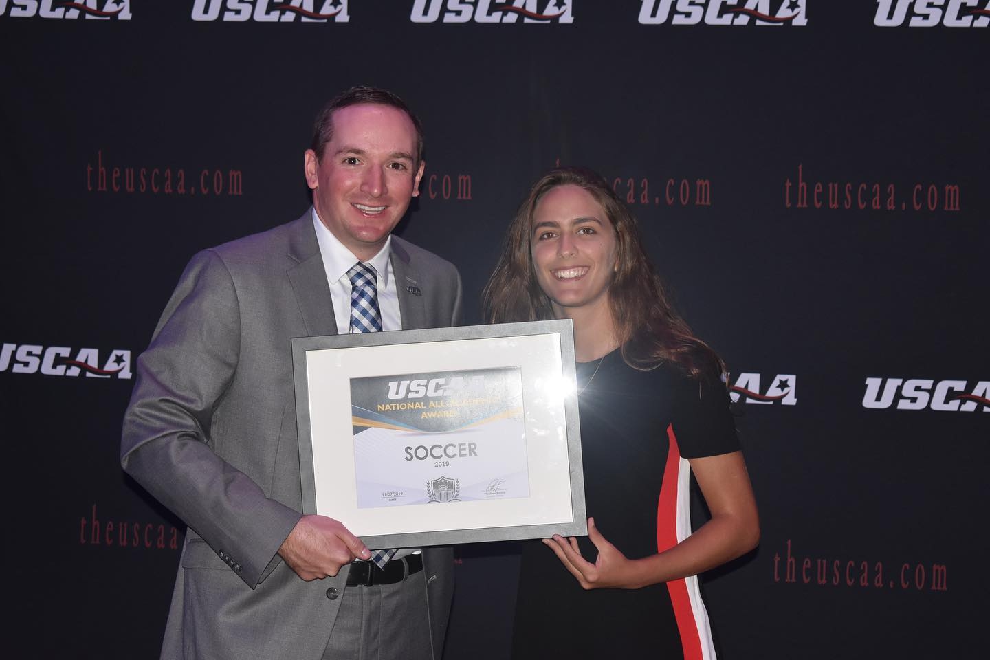 Women's soccer player Bethania Cruz Receiving the All-Academic award