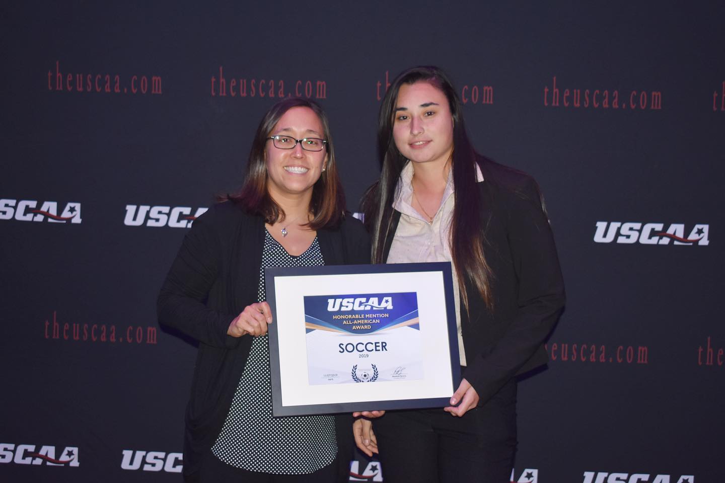 Women's soccer player Vanessa Osorio Receiving the All-American second team award