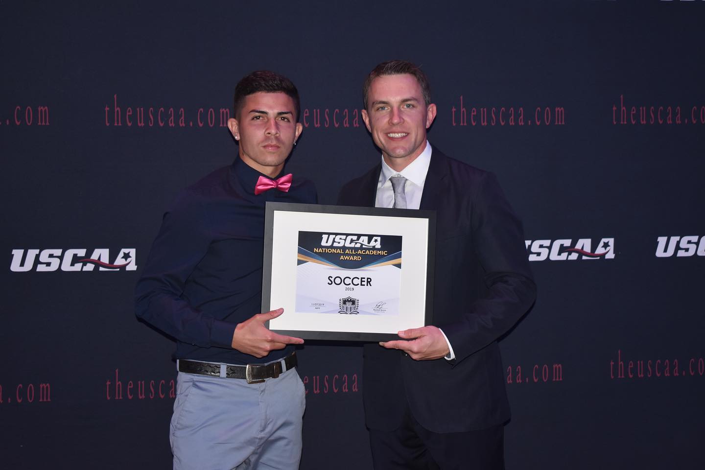 men's soccer player George Perez receiving the USCAA All-Academic Award