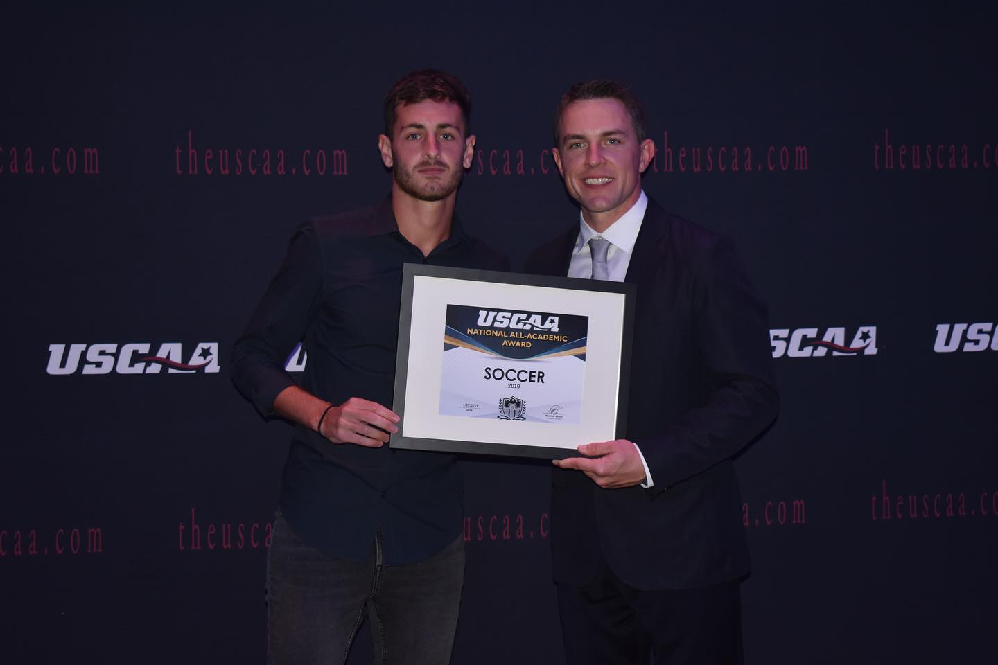 men's soccer player Tomas Casavilla receiving the USCAA All-Academic Award