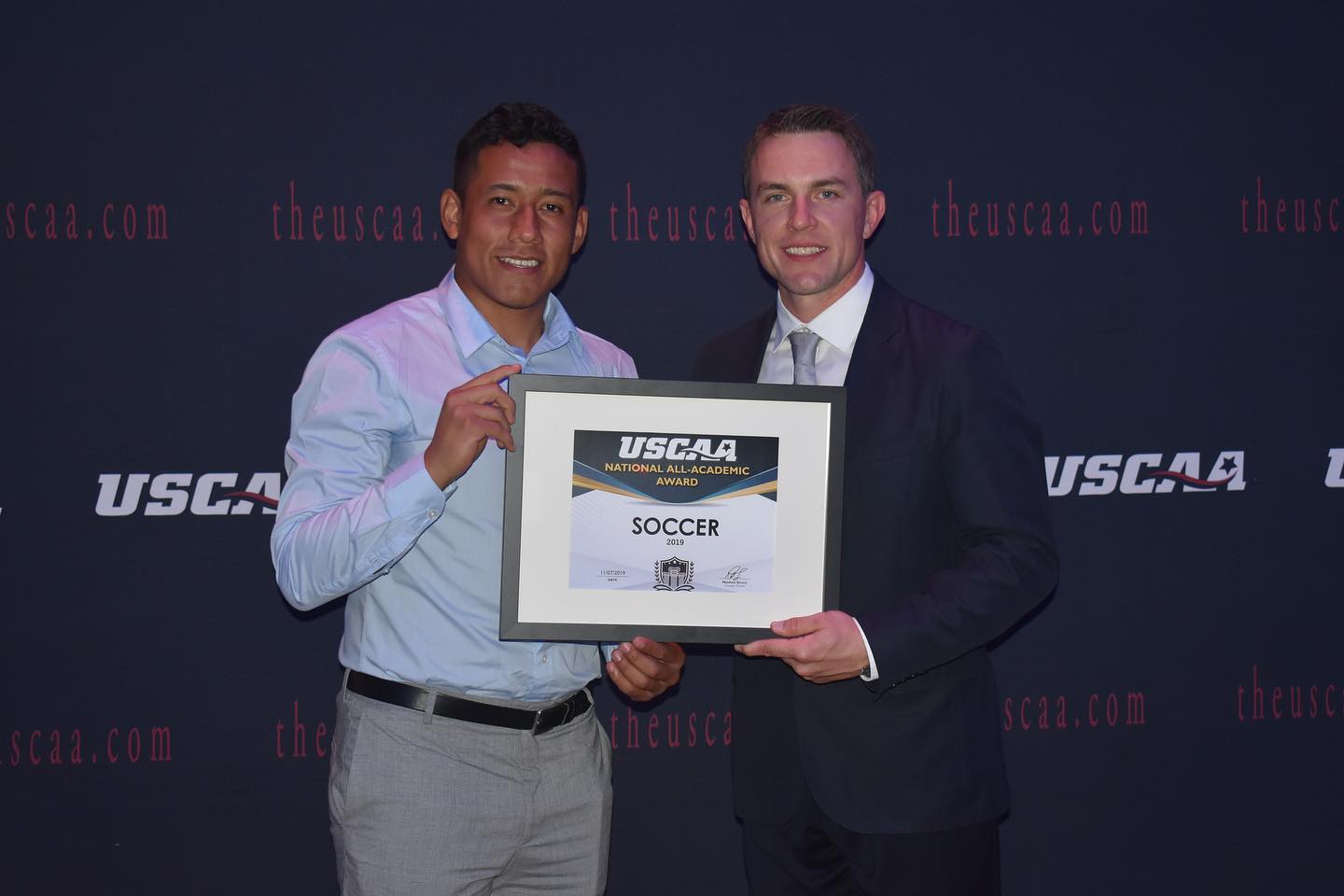 men's soccer player Victor Ruiz receiving the USCAA All-Academic Award