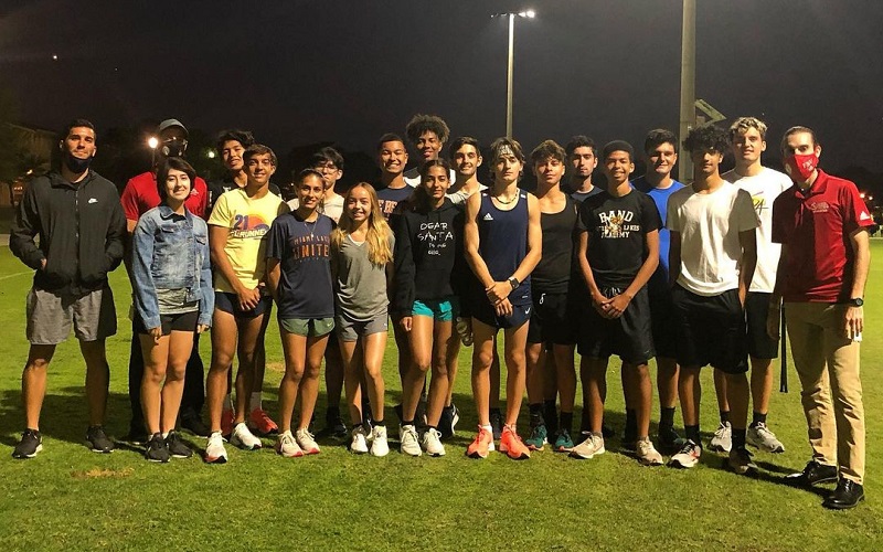 Group Picture of Community Outreach with Mater Lakes Track Team