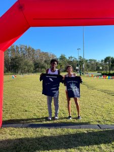 FNU's David Bellefleur and Maryam Abreu holding their Top-Ten Finsher T-shirts after competing in the Ave Maria Invitational