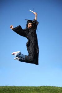 Grad student jump posing