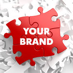 Your Brand Concept on Red Puzzle.