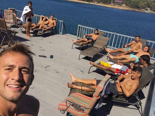 Men's Soccer relaxing on the double decker dock in Smith Lake Alabama