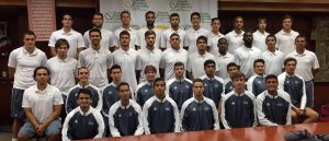 Men's Soccer Team Picture in Gold Room at Florida National University