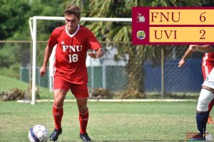 FNU men's soccer player and the score showing FNU 6 UVI 2