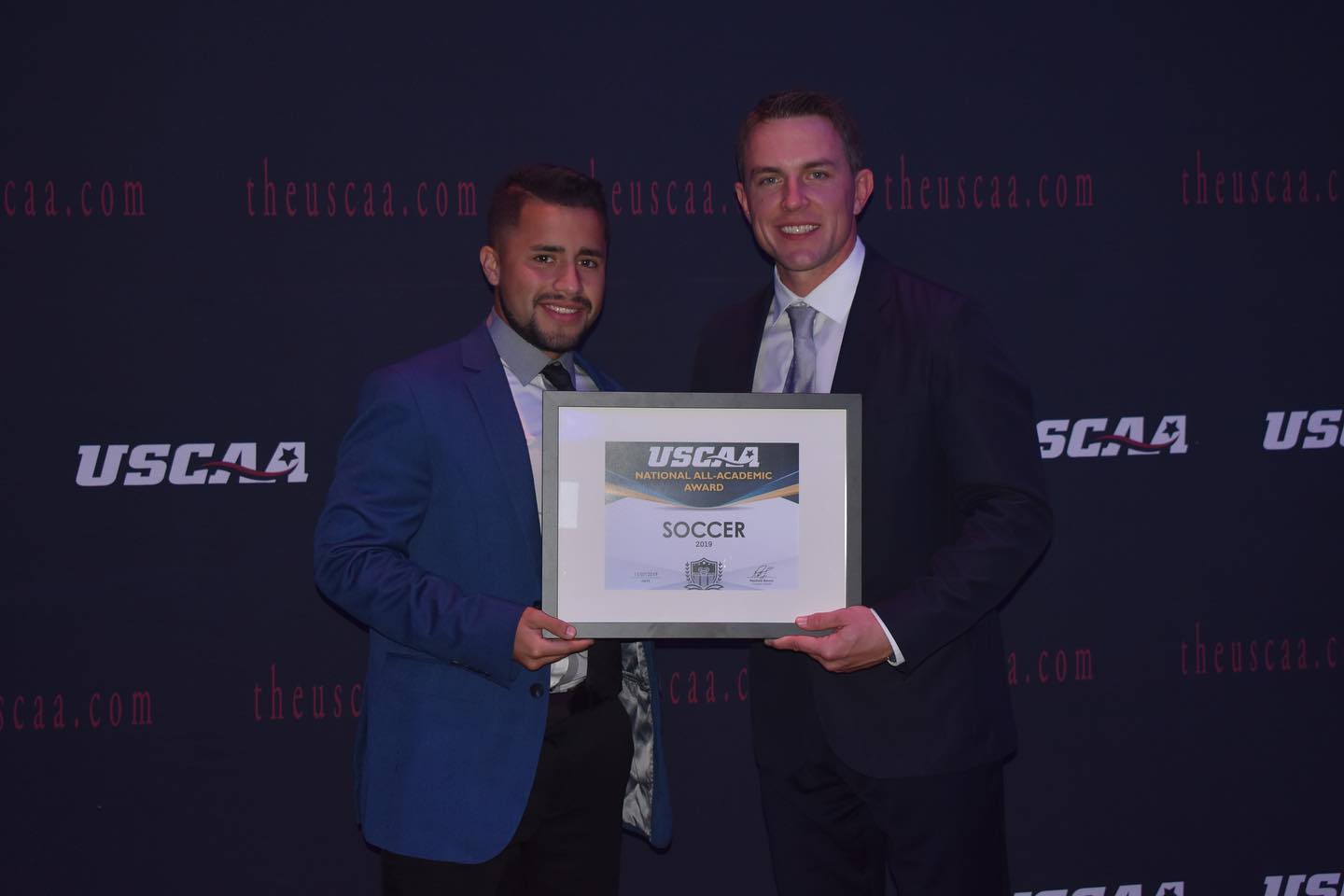men's soccer player Jesus Caballero receiving the USCAA All-Academic Award