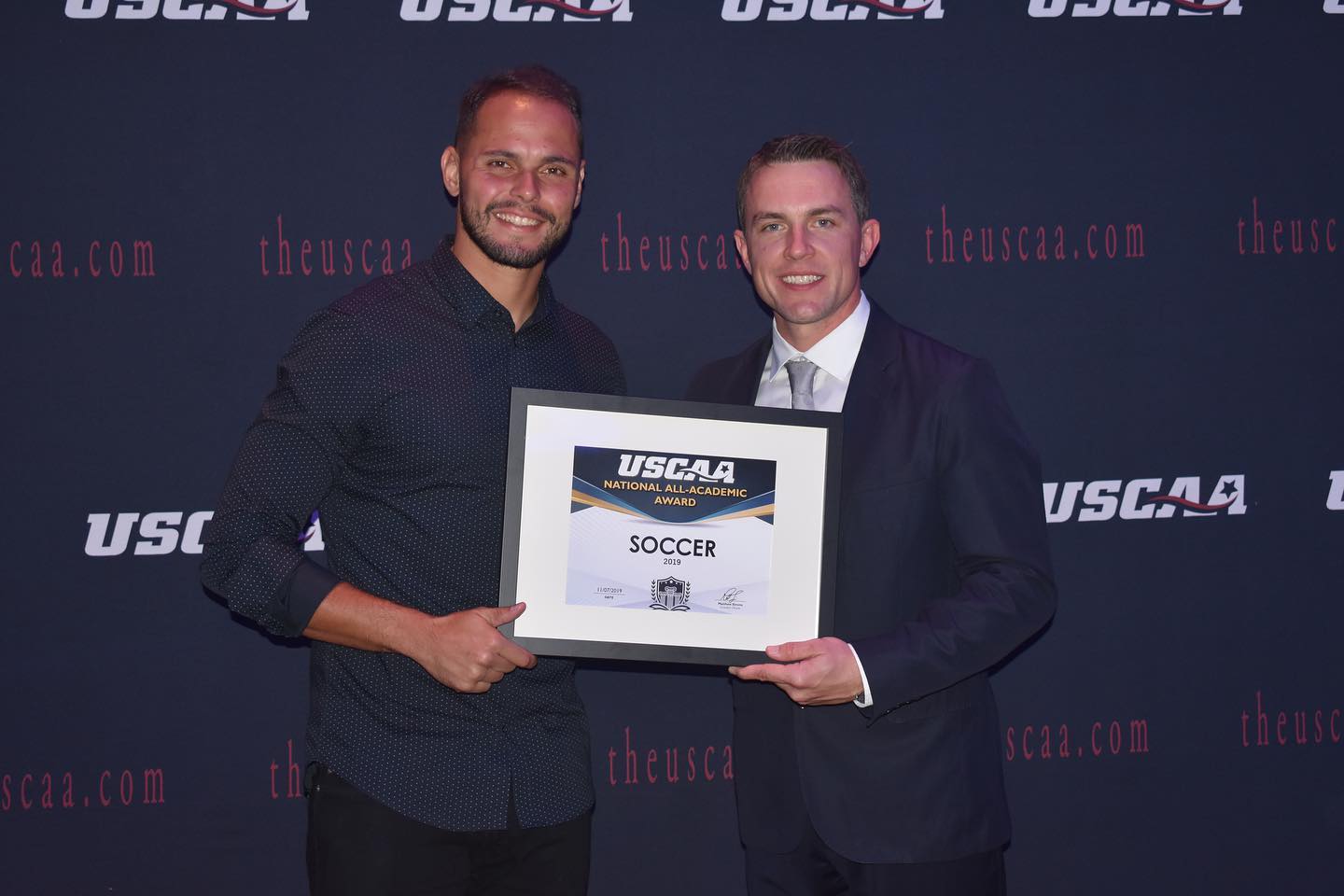 men's soccer player Rodrigo Festuccia receiving the USCAA All-Academic Award