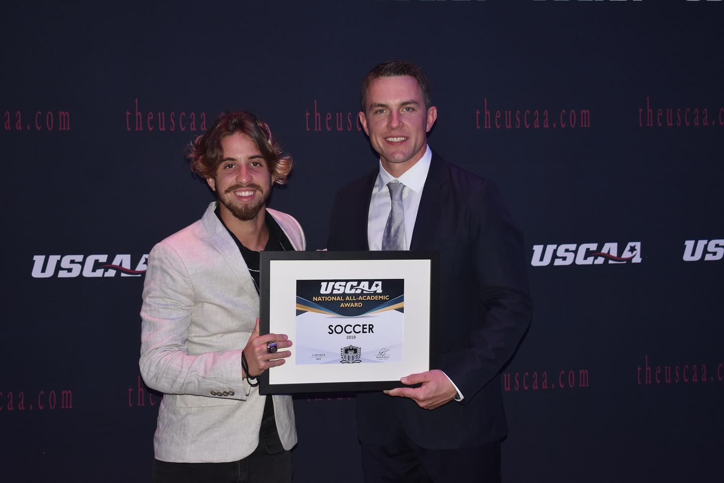 men's soccer player Victor Surya receiving the USCAA All-Academic Award