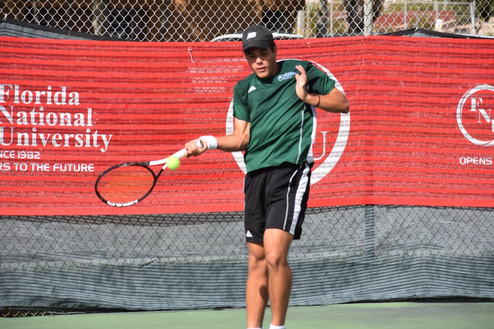 FNU Tennis player Geronimo Vivero in action in the game