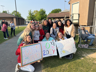 FNU softball players supported a local DuBois, Pa., little league star at her latest game while at the USCAA Small College World Series.